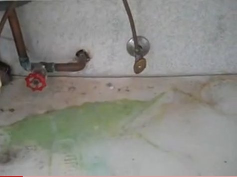 water damaged sink cabinet