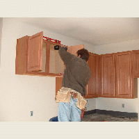 Cabinet installer