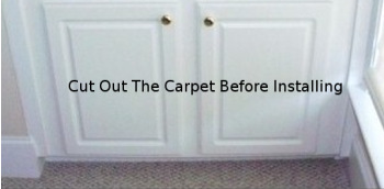 Cabinet Installed On Carpet There would be extensive work required to remove this cabinet if the carpet ever gets flooded.